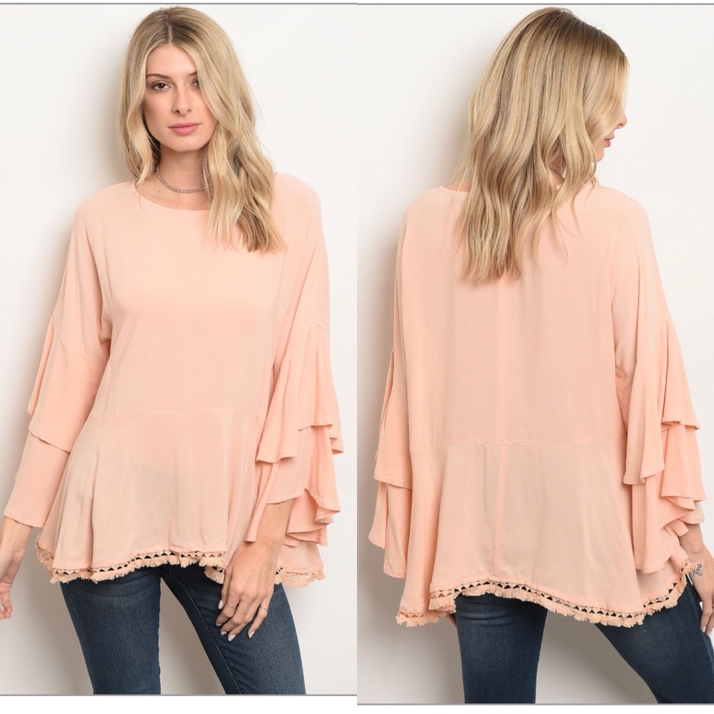 Bell sleeve ruffled lace blouse.